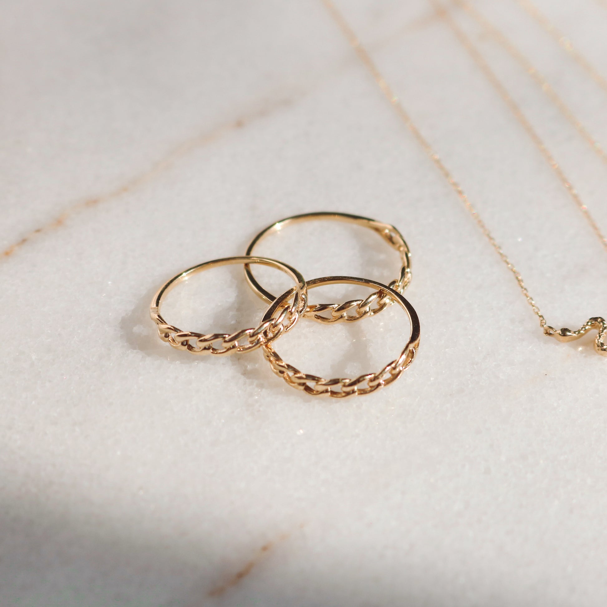 three gold chain rings on marble, 14k gold chain ring, dainty chain ring, 14k chain ring