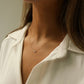 three stone moonstone pendant made of 14k solid gold with a dainty minimal chain